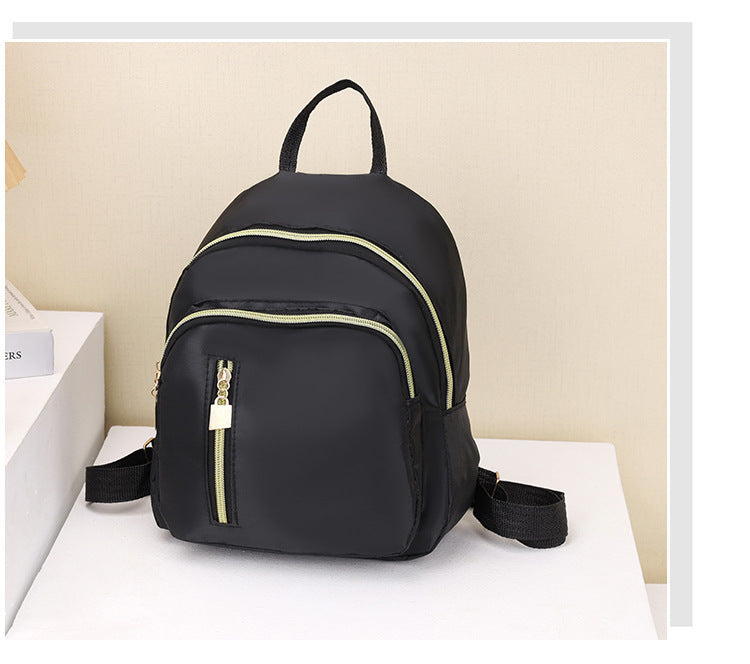 Women's Black Nylon Mini Backpack Casual Daypack with Gold Accent Zippers
