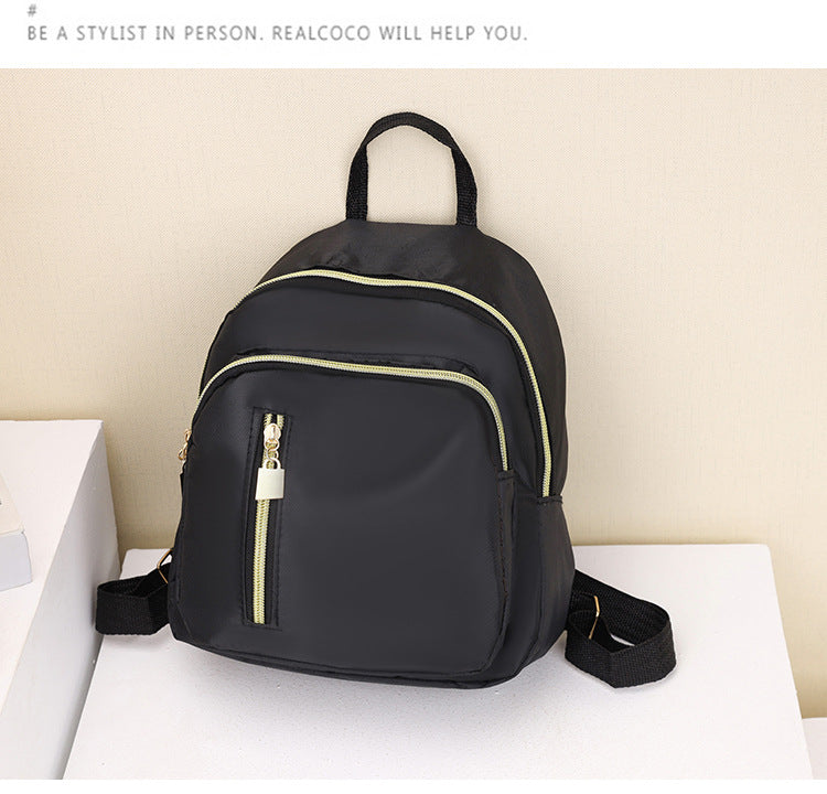 Women's Black Nylon Mini Backpack Casual Daypack with Gold Accent Zippers
