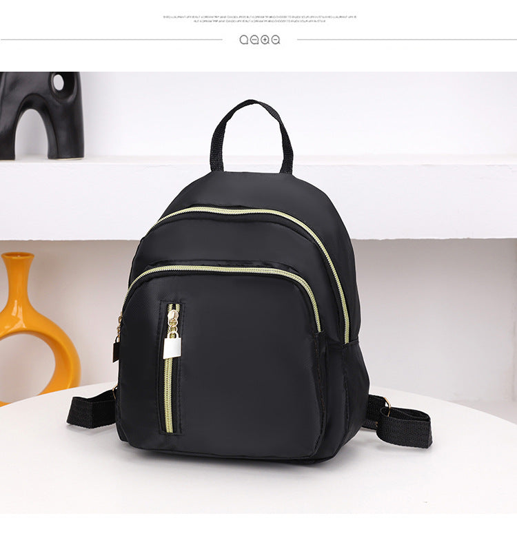 Women's Black Nylon Mini Backpack Casual Daypack with Gold Accent Zippers