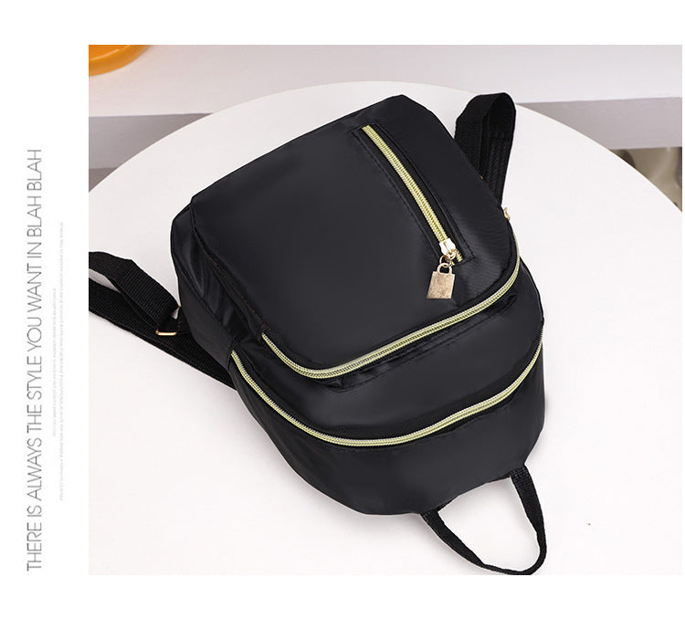Women's Black Nylon Mini Backpack Casual Daypack with Gold Accent Zippers